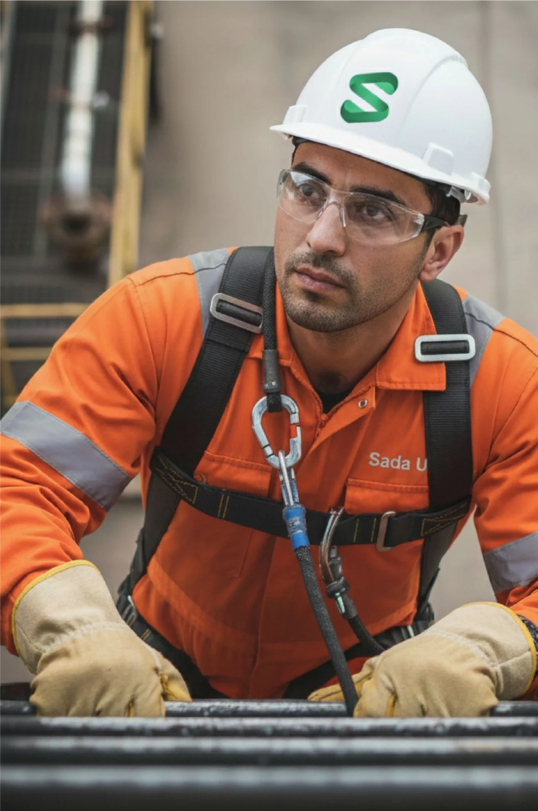 A Sada Ulgam field technician in full protective equipment at the Hazar Harbour base